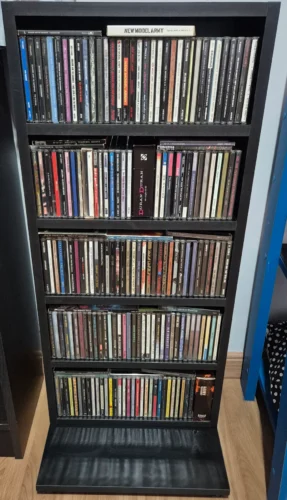 estante para cds com porta de vidro ev 231